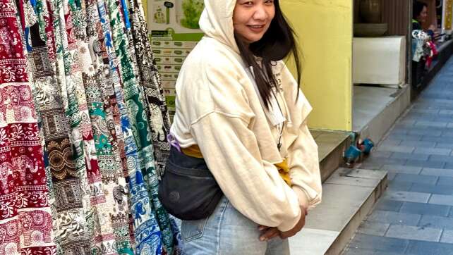 Thais in Pullover und Wolljacke: «Kältewelle» in Bangkok